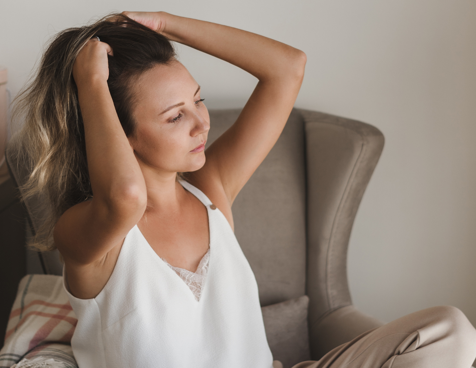 Woman massaging her scalp