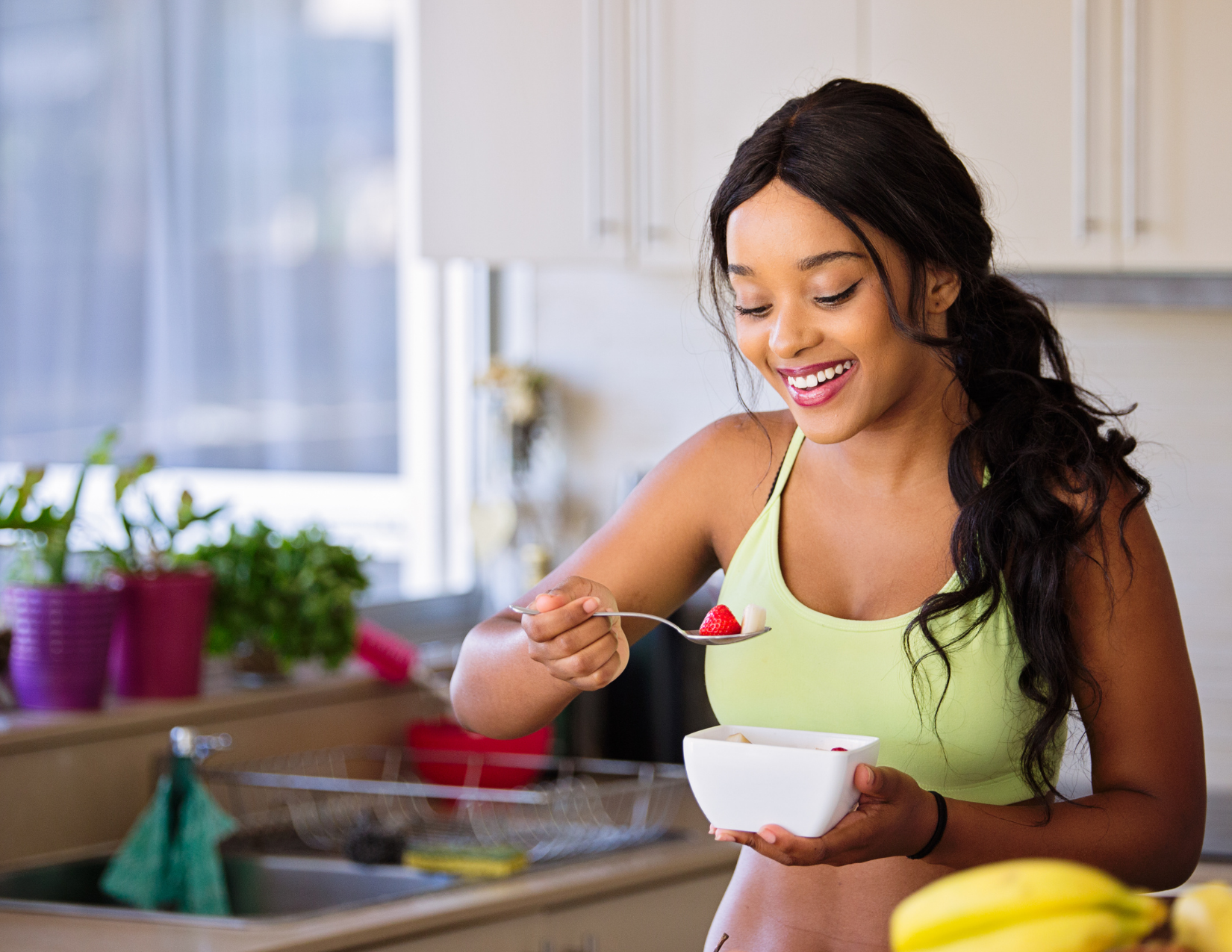 Woman eating fruit