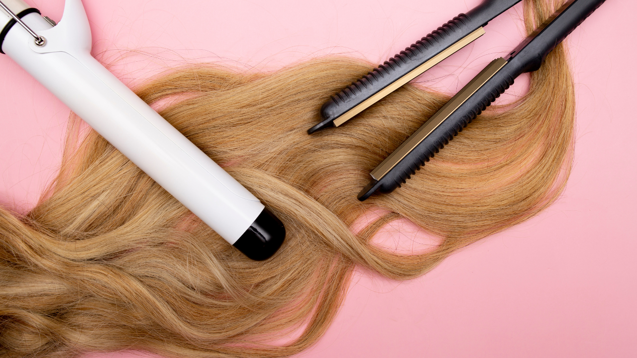 curling iron and straightener on top of hair extensions