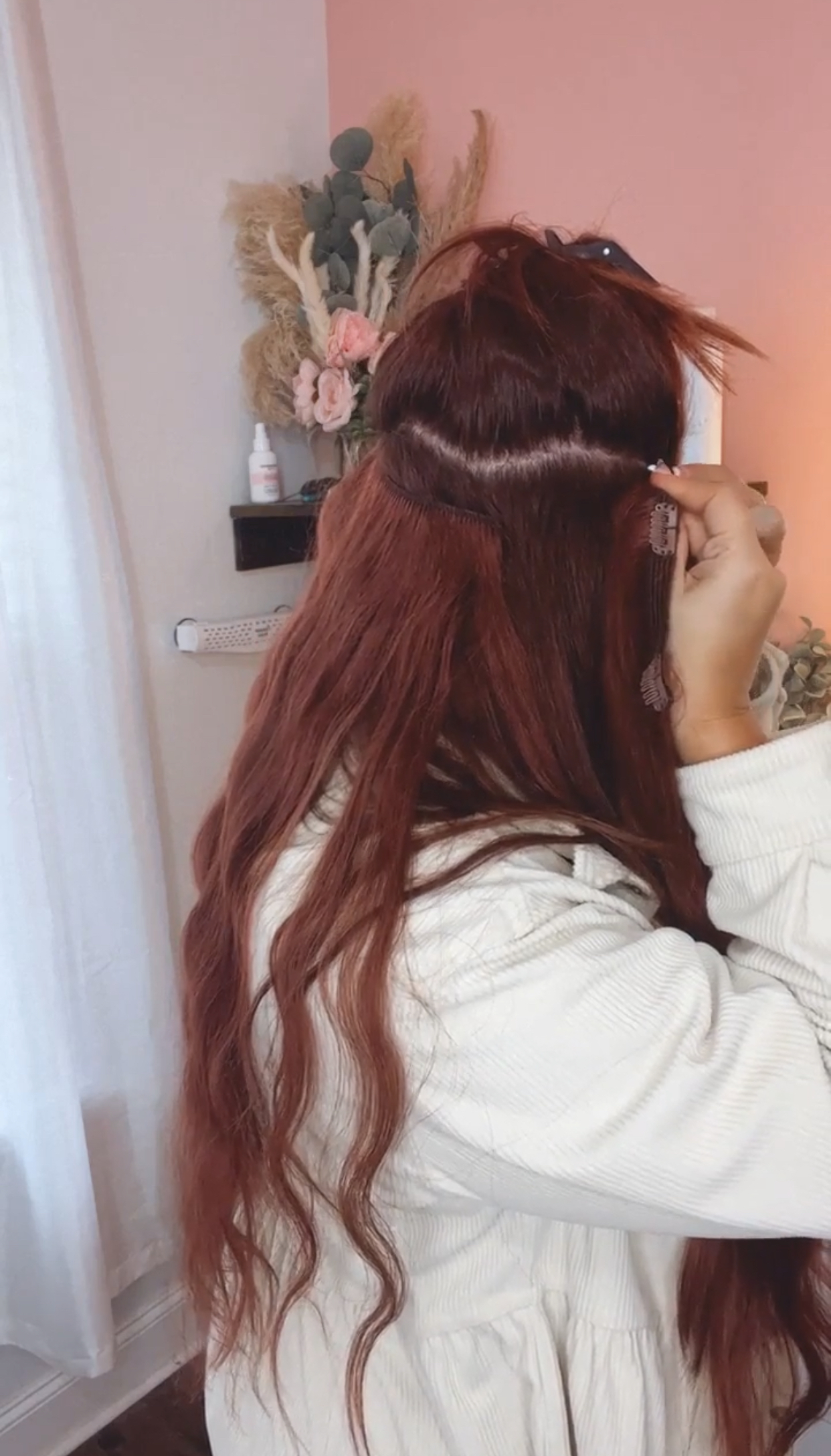 clipping in two tracks of Cashmere Hair extensions 