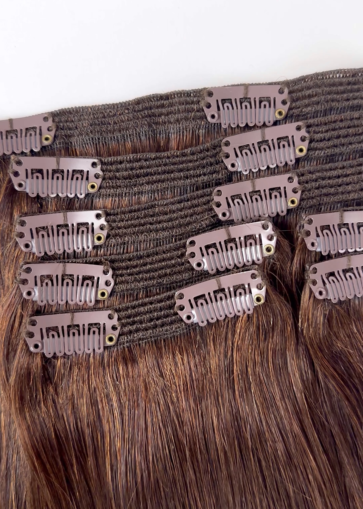 close up photo of the track designs on the cashmere hair classic clip-in extensions