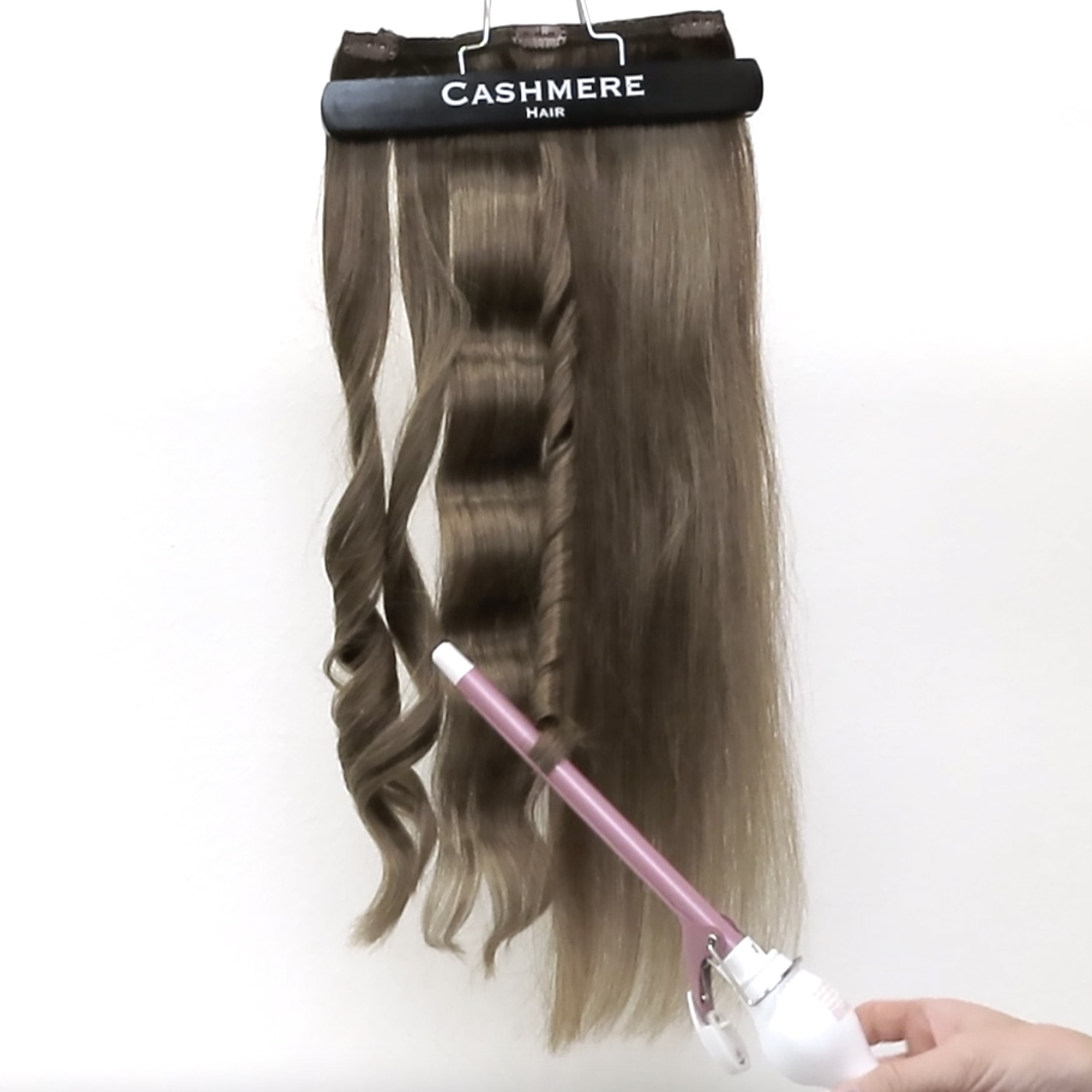 curling ends of hair with mini curling iron